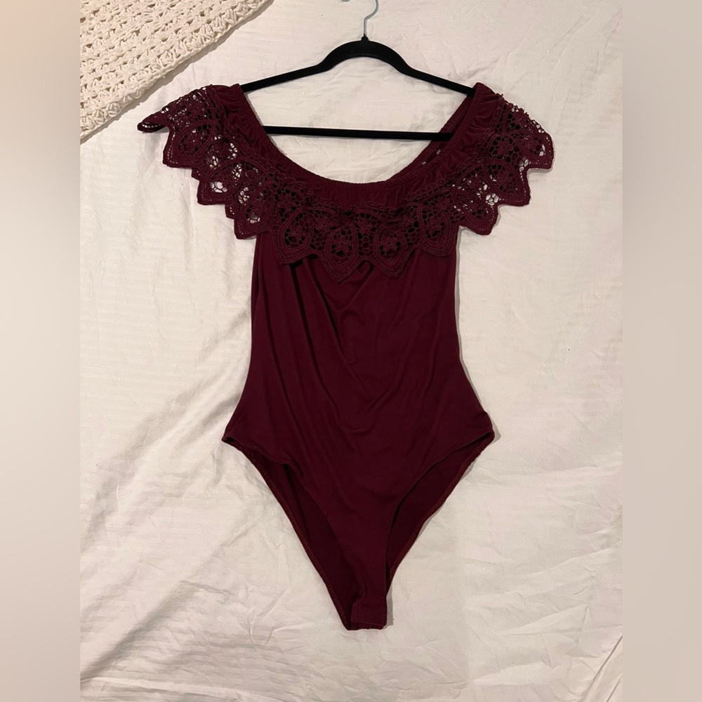 Charlotte Russe purple embroidered bodysuit